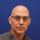 Доктор Арнон Карни